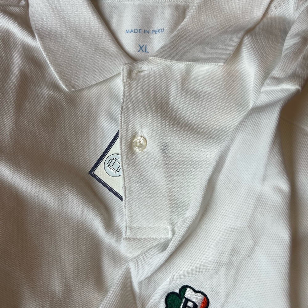 New Golf Shirt with a logo on sleeve